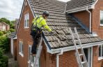 Roofer_inspecting_damaged_roof_t…_202605261745 Roofer_inspecting_damaged_roof_t…_202605261745