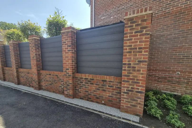 brick-pillar-retaining-wall-grey-composite-panels-resin-bound